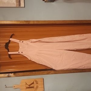 Soft pink jumpsuit.